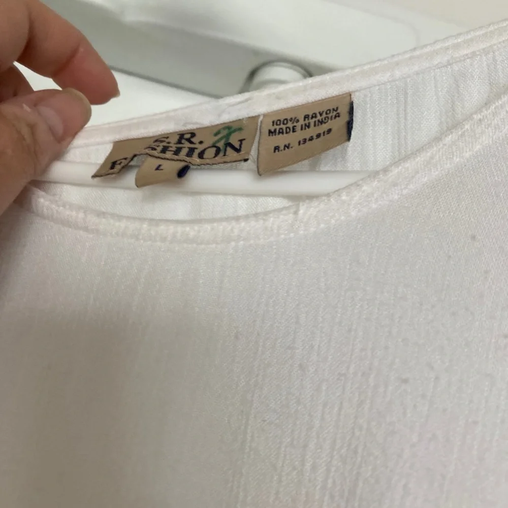 A. F. Fashion white gauze dress size large with some geometric decor. - Picture 7 of 13